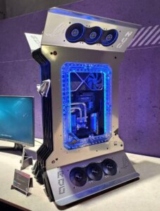 MAXIMUS custom PC tower by Mike Petereyns (MP-Customized) displayed with blue LED lighting at exhibition