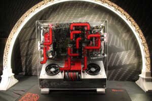 Front view of Shui-Shen PC mod by MP-Customized showing intricate red water cooling channels and fans