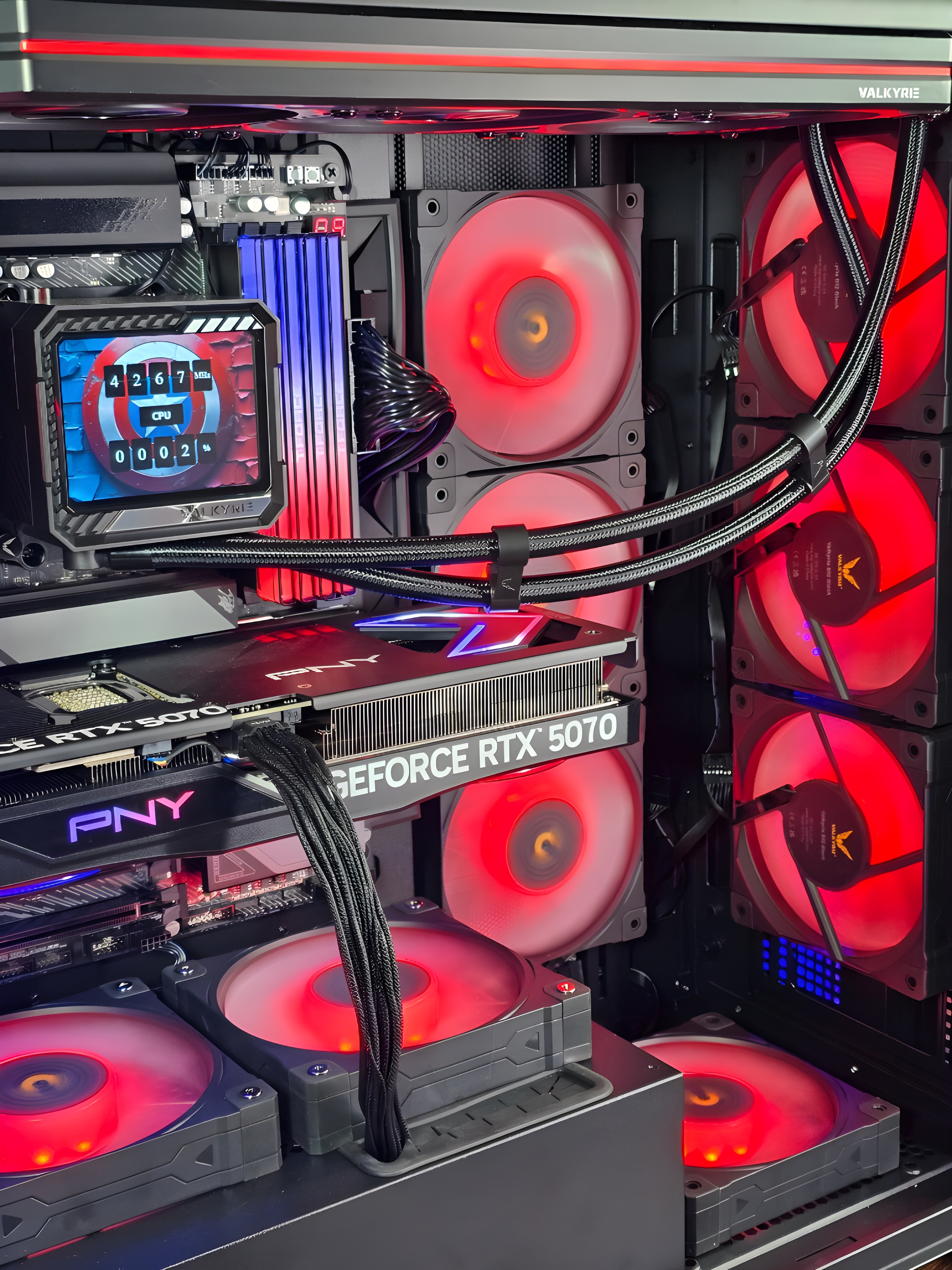Interior of MVP Gaming PC’s Captain America build featuring RTX 5070 and red lighting powered by Seasonic