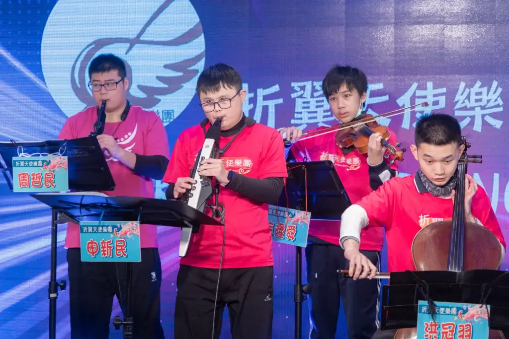 Members of the Broken Wings Angels Band performing during a Sea Sonic community event, highlighting inclusion and empowerment through music.