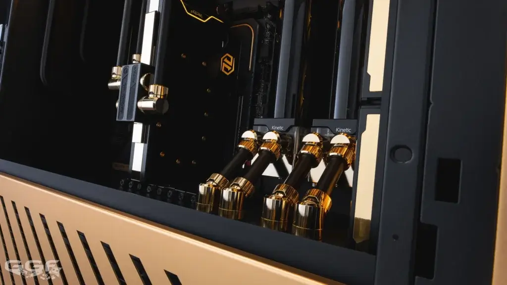Close-up view of the gold and black cooling loop inside the GGF Events Gold Edition PC build powered by a Seasonic PRIME 1300W PSU.