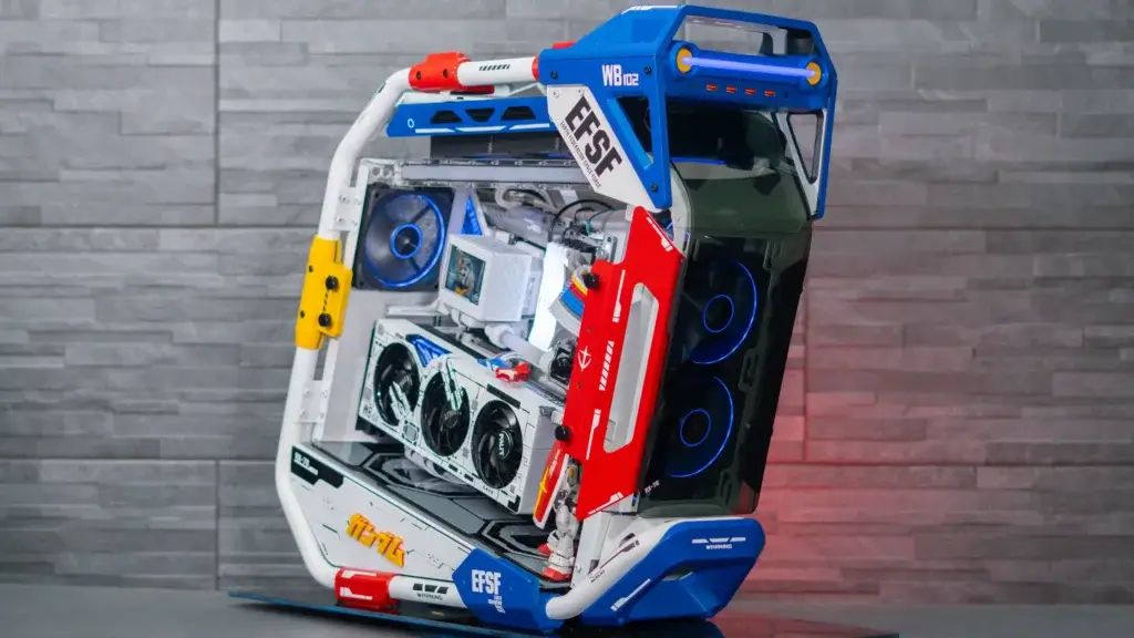 Gundam-inspired custom PC build by Quantum Labs featuring a mechanical open-frame design and themed color panels